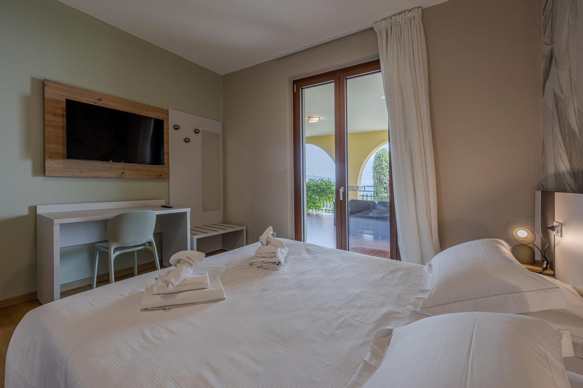 Residence San Michele Костермано Экстерьер фото